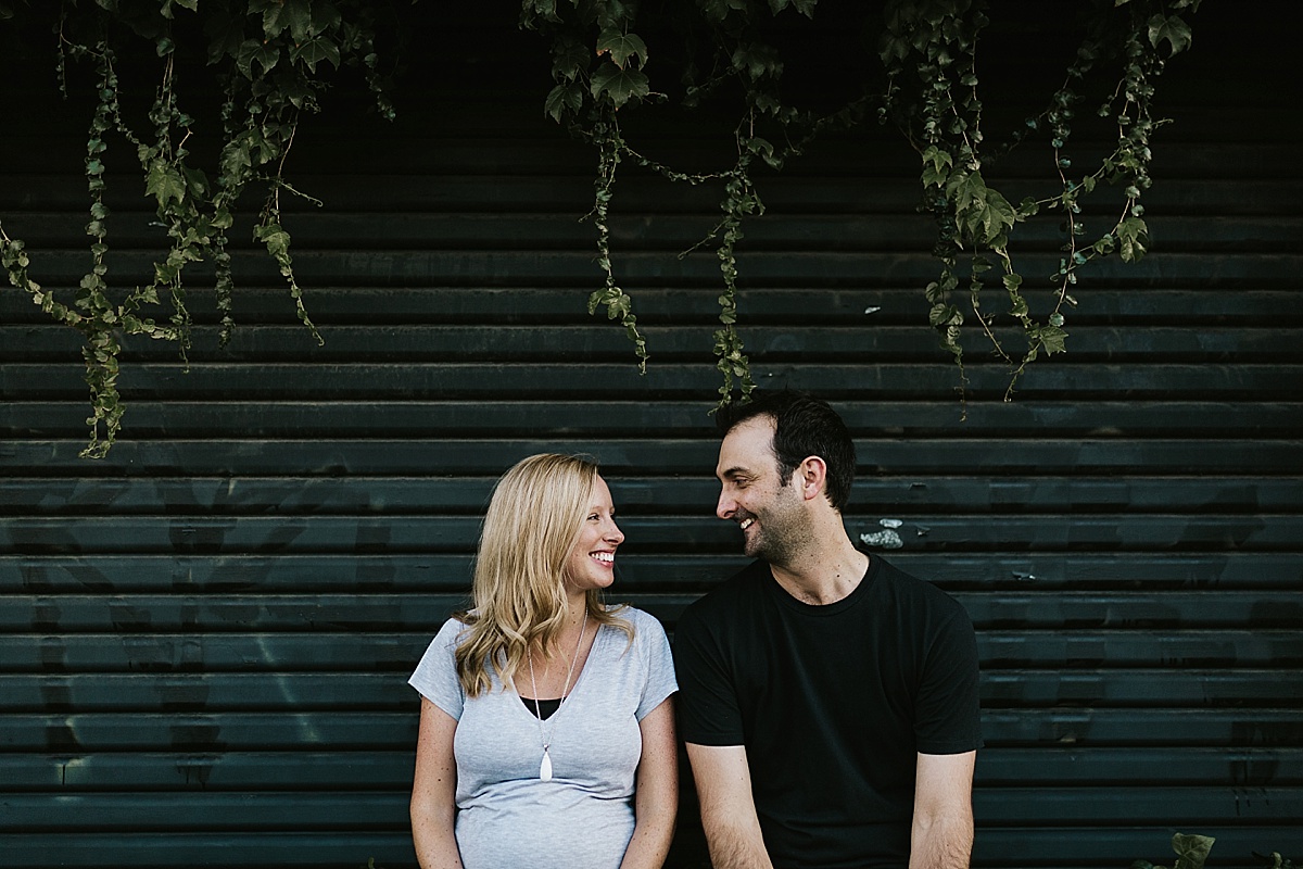 Jacquie&Hayden_Fun-Richmond-Urban-Engagement-Session-Relaxed-Candid_26
